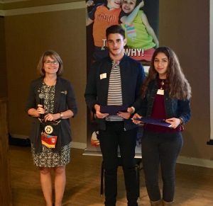 Miquel and Javiera earn Paul Harris Awards from Greater Corvallis Rotary and President Judy Corwin (left)